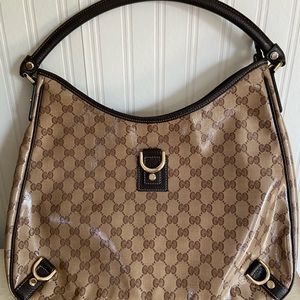 Beautiful Gucci patent leather traditional pattern.